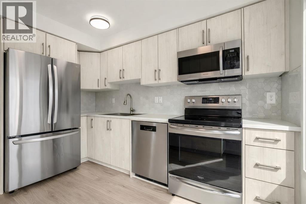 103 Coachway Lane SW, Calgary, Alberta  T3H 2V9 - Photo 8 - A2290563