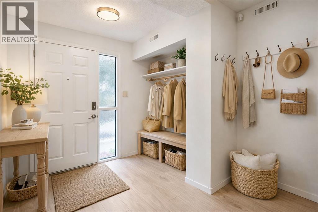 103 Coachway Lane SW, Calgary, Alberta  T3H 2V9 - Photo 2 - A2290563