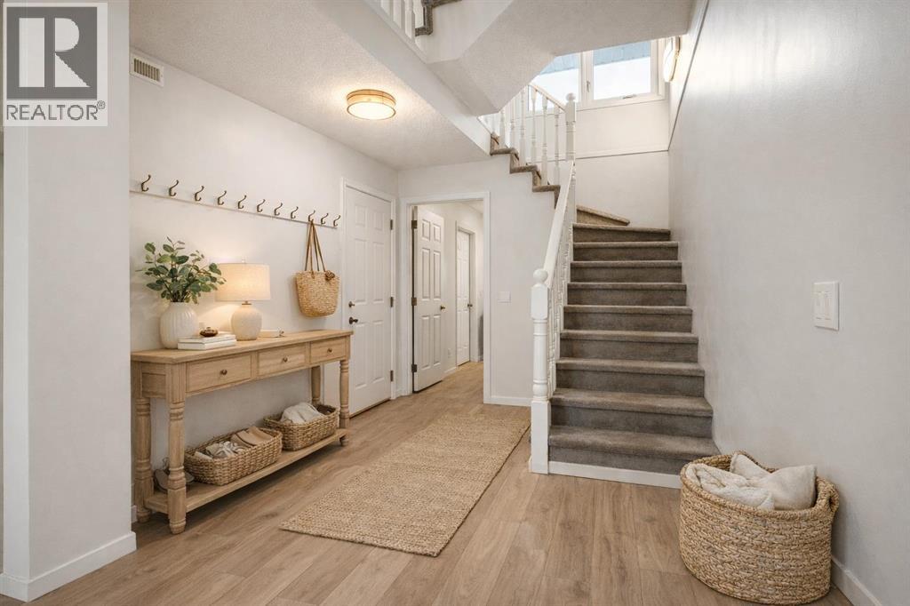 103 Coachway Lane SW, Calgary, Alberta  T3H 2V9 - Photo 3 - A2290563