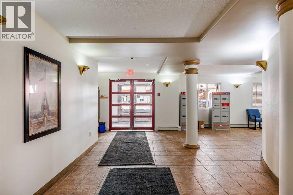 103, 777 3 Avenue Sw, Calgary, Alberta  T2P 0G8 - Photo 3 - A2295266