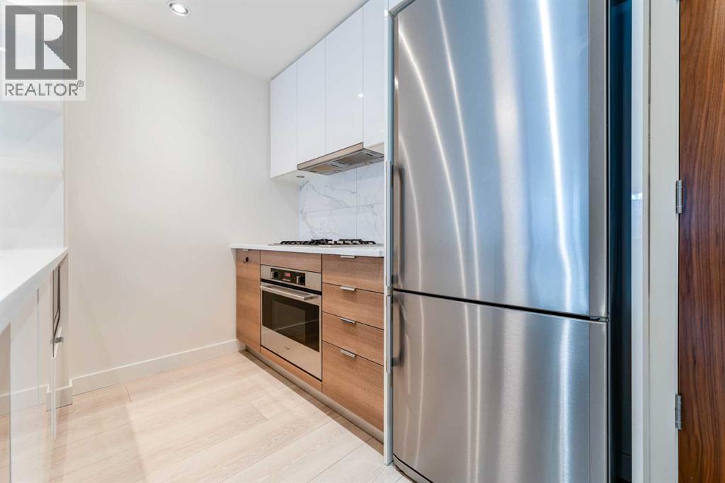 401, 138 Waterfront Court SW, Calgary, Alberta  T2P 1L1 - Photo 9 - A2299050