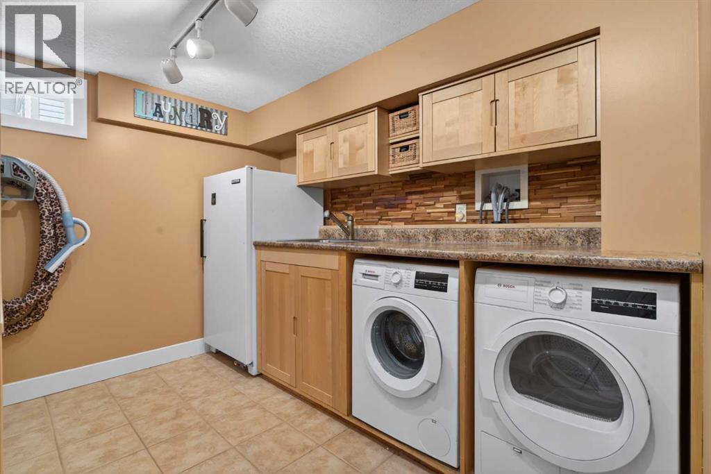 31 Rosetree Road Nw, Calgary, Alberta  T2K 1M8 - Photo 35 - A2301030