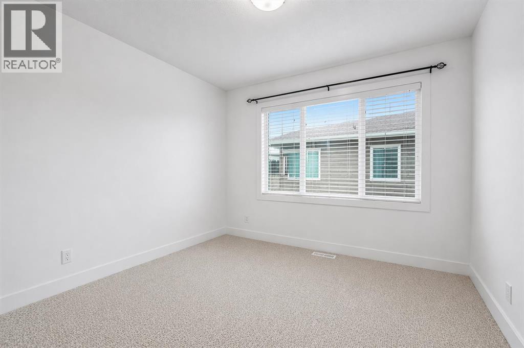 310, 669 Savanna Boulevard Ne, Calgary, Alberta  T3J 2K2 - Photo 21 - A2301401