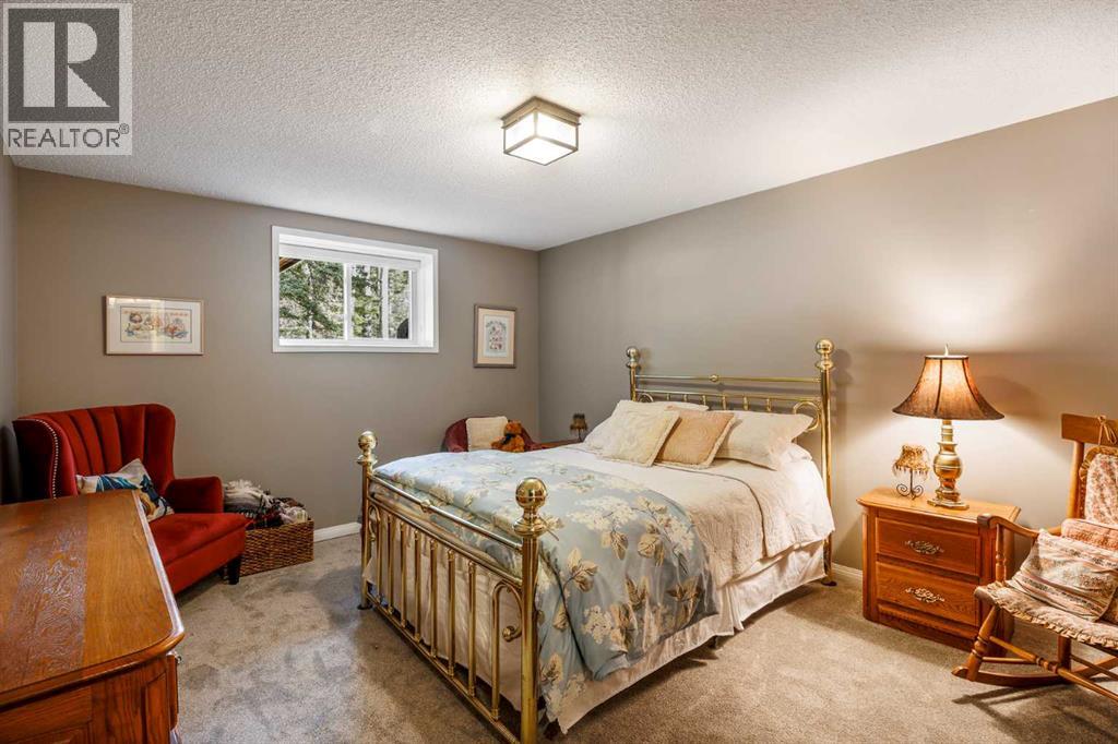 94 Sunset Way, Priddis Greens, Alberta  T0L 1W3 - Photo 32 - A2302298