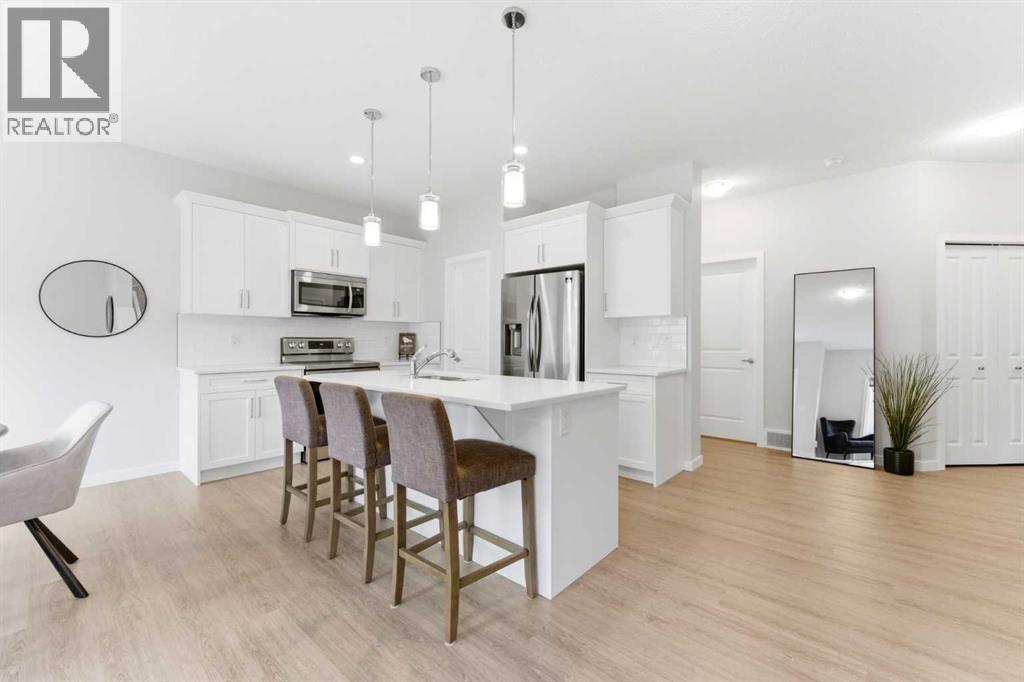 69 Legacy Manor Se, Calgary, Alberta  T2X 2E9 - Photo 4 - A2302444