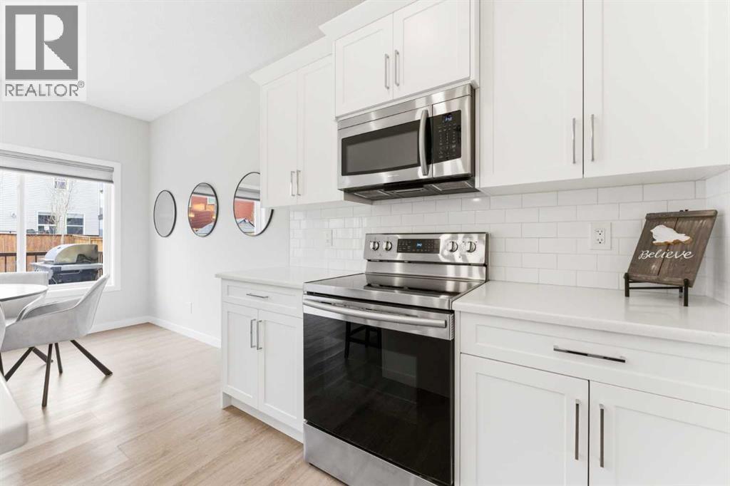 69 Legacy Manor Se, Calgary, Alberta  T2X 2E9 - Photo 5 - A2302444