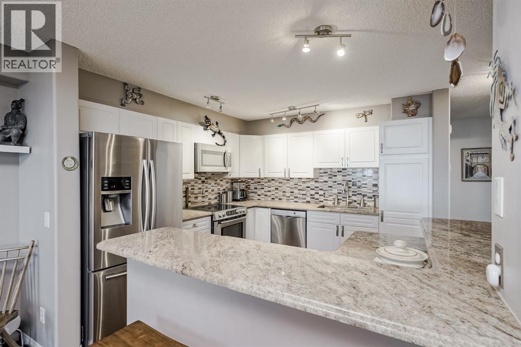 25, 200 Sandstone Drive Nw, Calgary, Alberta  T3K 4N7 - Photo 2 - A2302667