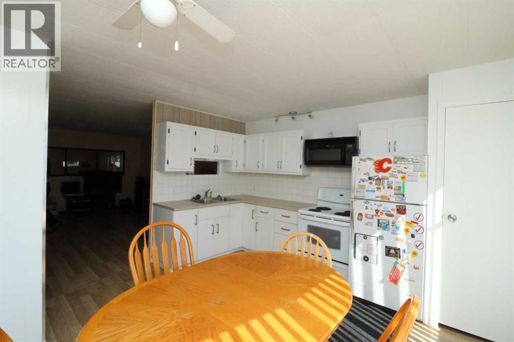 152 Big Springs Drive Se, Airdrie, Alberta  T4A 1L4 - Photo 4 - A2303574