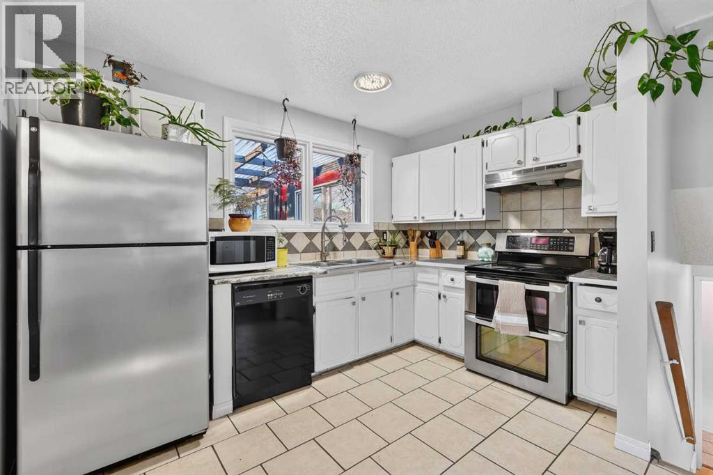 928 Pinecliff Drive Ne, Calgary, Alberta  T1Y 3Y2 - Photo 9 - A2299116