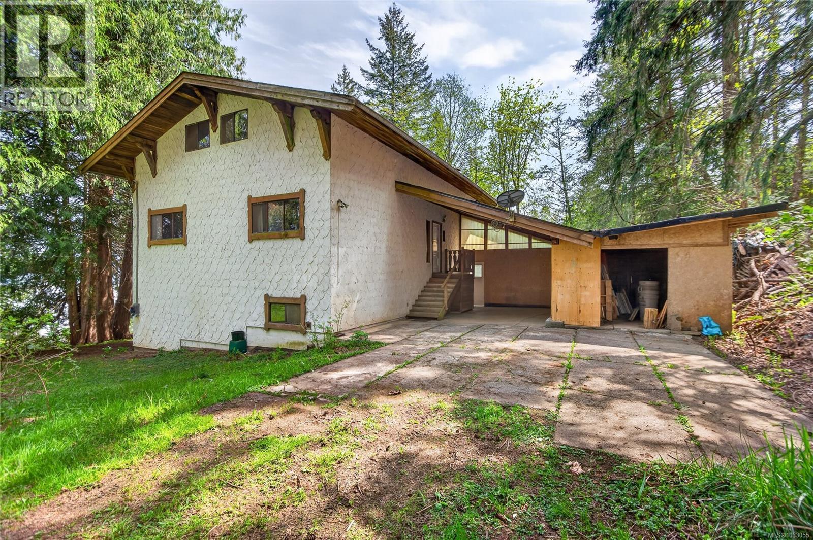 7191 Island Hwy, Fanny Bay, British Columbia  V0R 1W0 - Photo 1 - 1033055