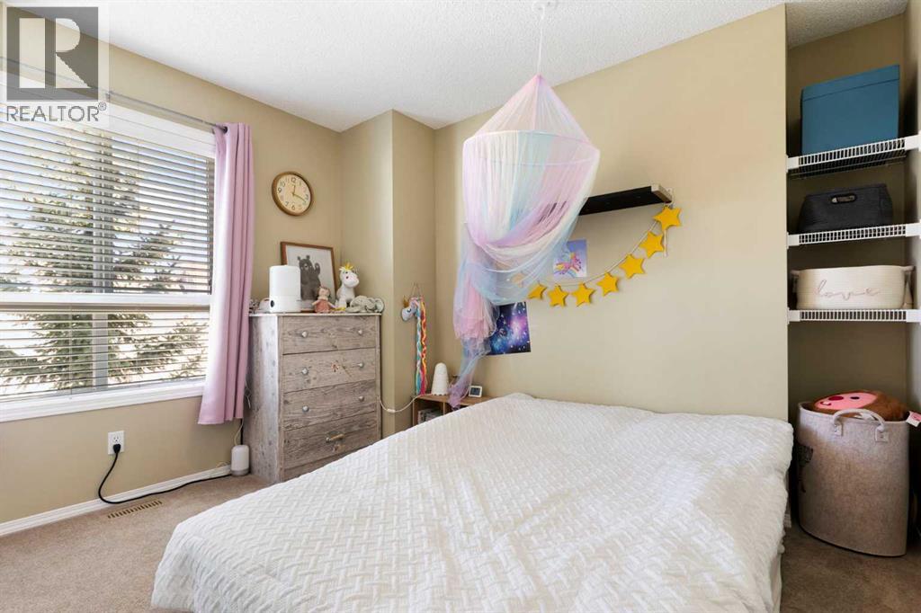 18 Tuscany Court NW, Calgary, Alberta  T3L 2Y8 - Photo 21 - A2294917