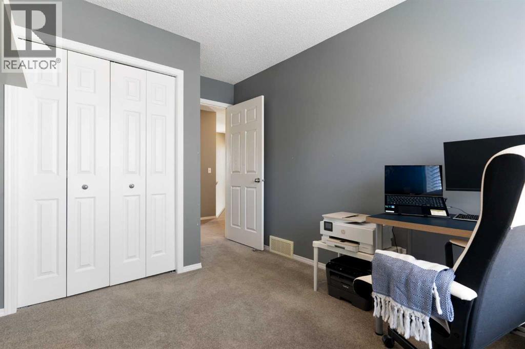 18 Tuscany Court NW, Calgary, Alberta  T3L 2Y8 - Photo 24 - A2294917