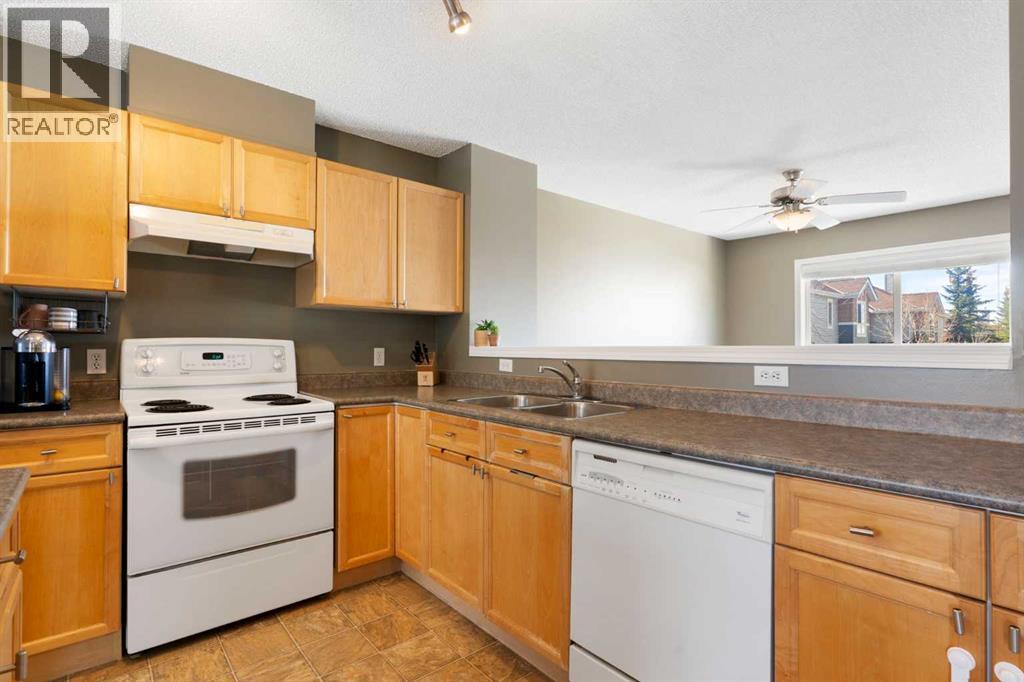 18 Tuscany Court NW, Calgary, Alberta  T3L 2Y8 - Photo 8 - A2294917