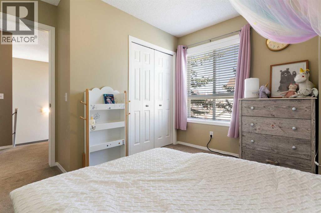 18 Tuscany Court NW, Calgary, Alberta  T3L 2Y8 - Photo 22 - A2294917