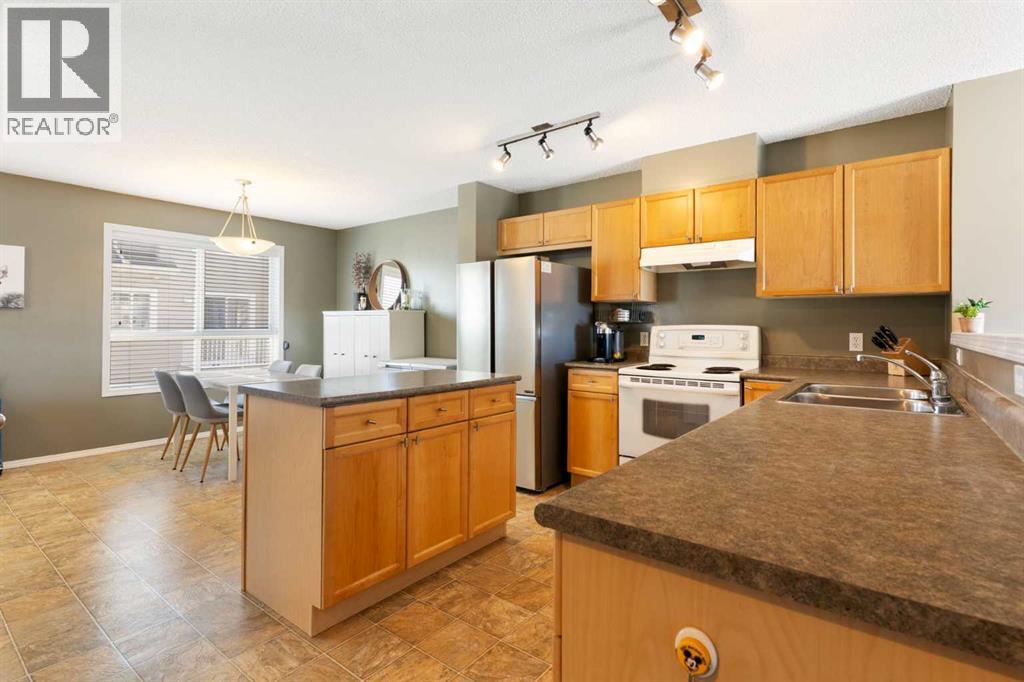 18 Tuscany Court NW, Calgary, Alberta  T3L 2Y8 - Photo 10 - A2294917