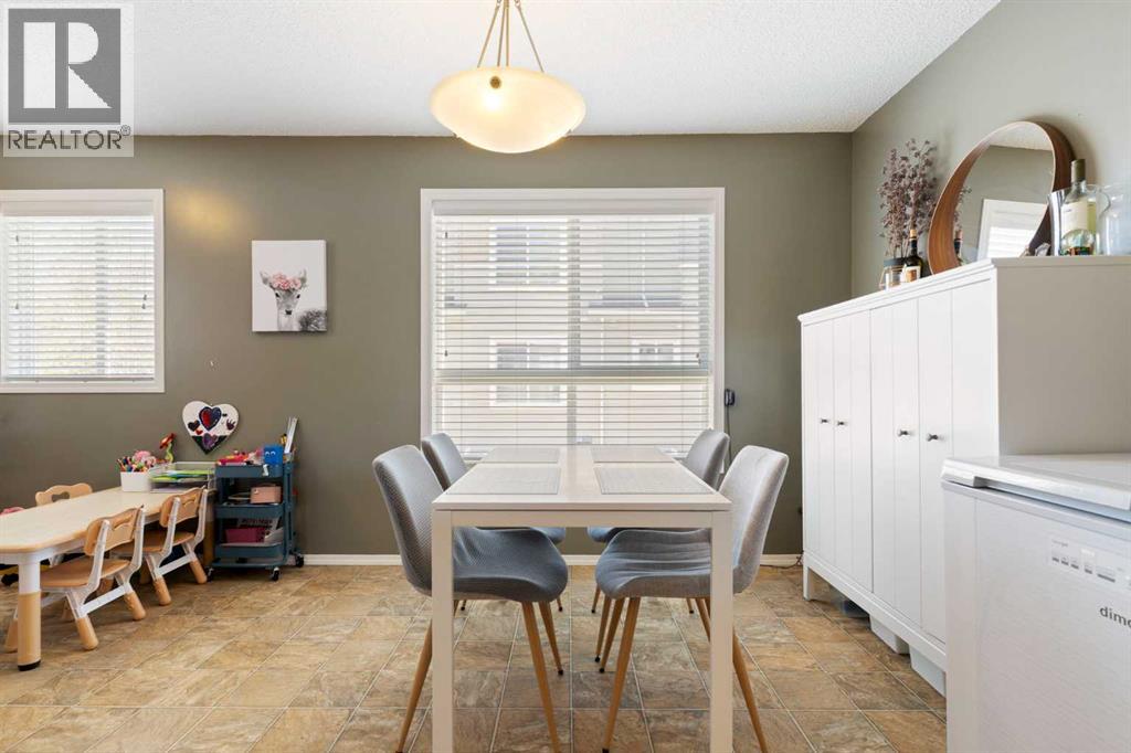 18 Tuscany Court NW, Calgary, Alberta  T3L 2Y8 - Photo 11 - A2294917