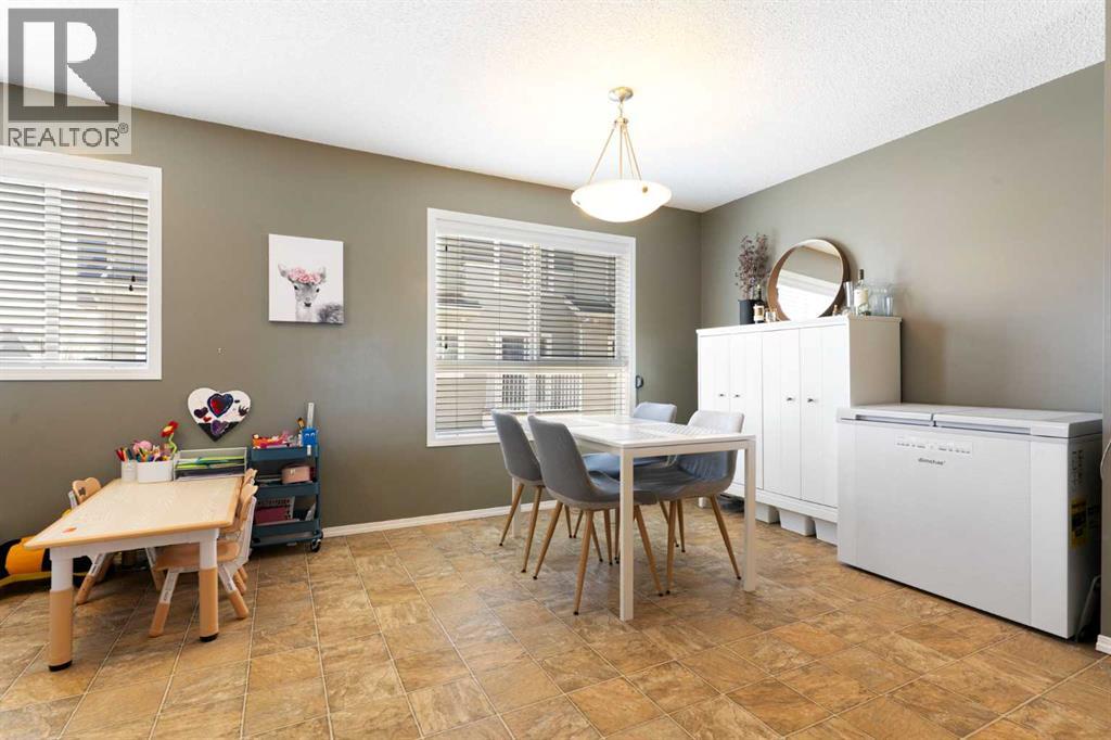 18 Tuscany Court NW, Calgary, Alberta  T3L 2Y8 - Photo 12 - A2294917