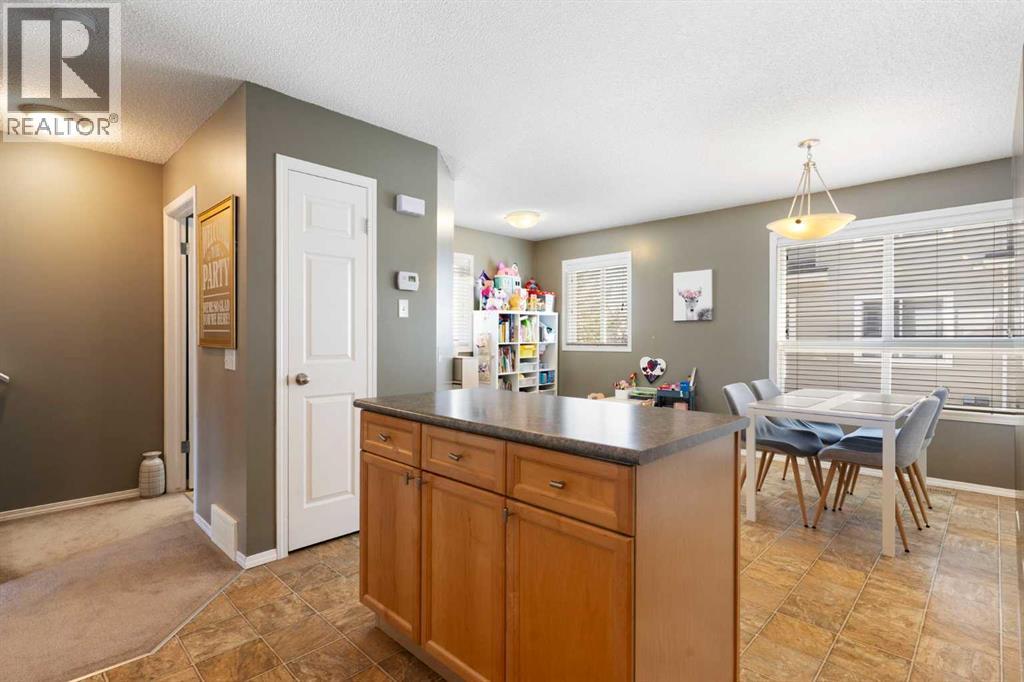 18 Tuscany Court NW, Calgary, Alberta  T3L 2Y8 - Photo 15 - A2294917