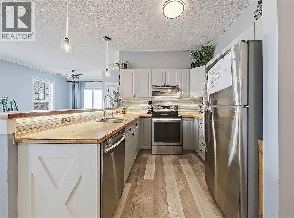 104 Prestwick Gardens SE, Calgary, Alberta  T2Z 3V4 - Photo 7 - A2299381