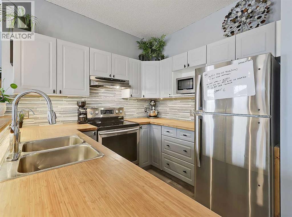 104 Prestwick Gardens SE, Calgary, Alberta  T2Z 3V4 - Photo 9 - A2299381