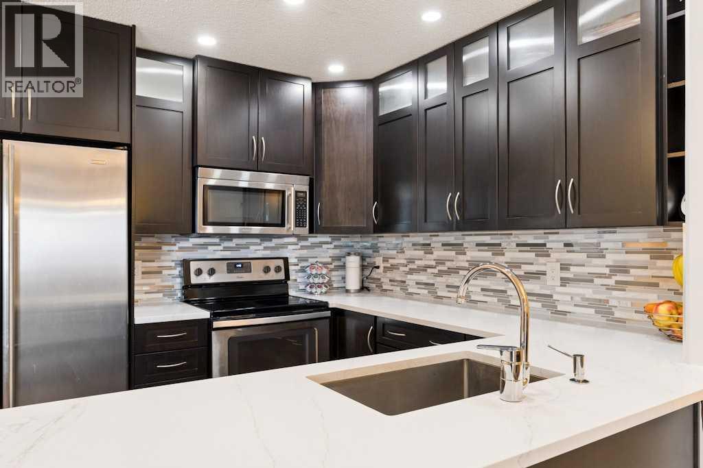 202, 345 Rocky Vista Park Nw, Calgary, Alberta  T3G 5K6 - Photo 4 - A2303641