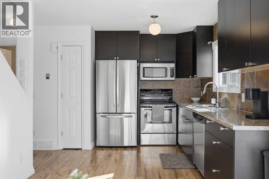 221 Deerpoint Lane Se, Calgary, Alberta  T2J 6M6 - Photo 11 - A2304085