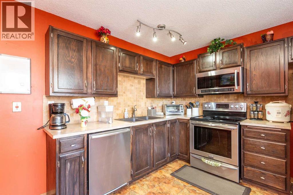 78 Queen Anne Close Se, Calgary, Alberta  T2J 6E5 - Photo 9 - A2304273