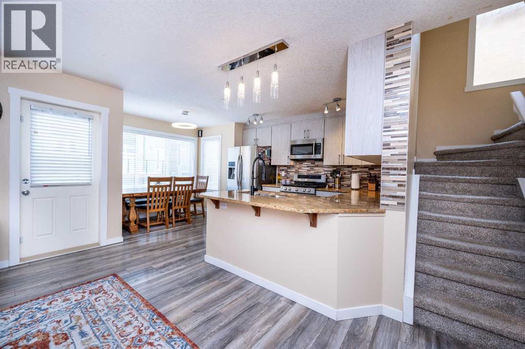 60 Covecreek Mews NE, Calgary, Alberta  T3K 0J6 - Photo 3 - A2297761