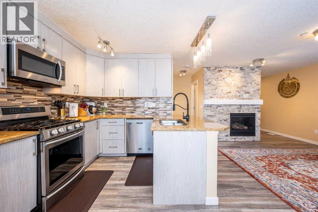 60 Covecreek Mews NE, Calgary, Alberta  T3K 0J6 - Photo 4 - A2297761