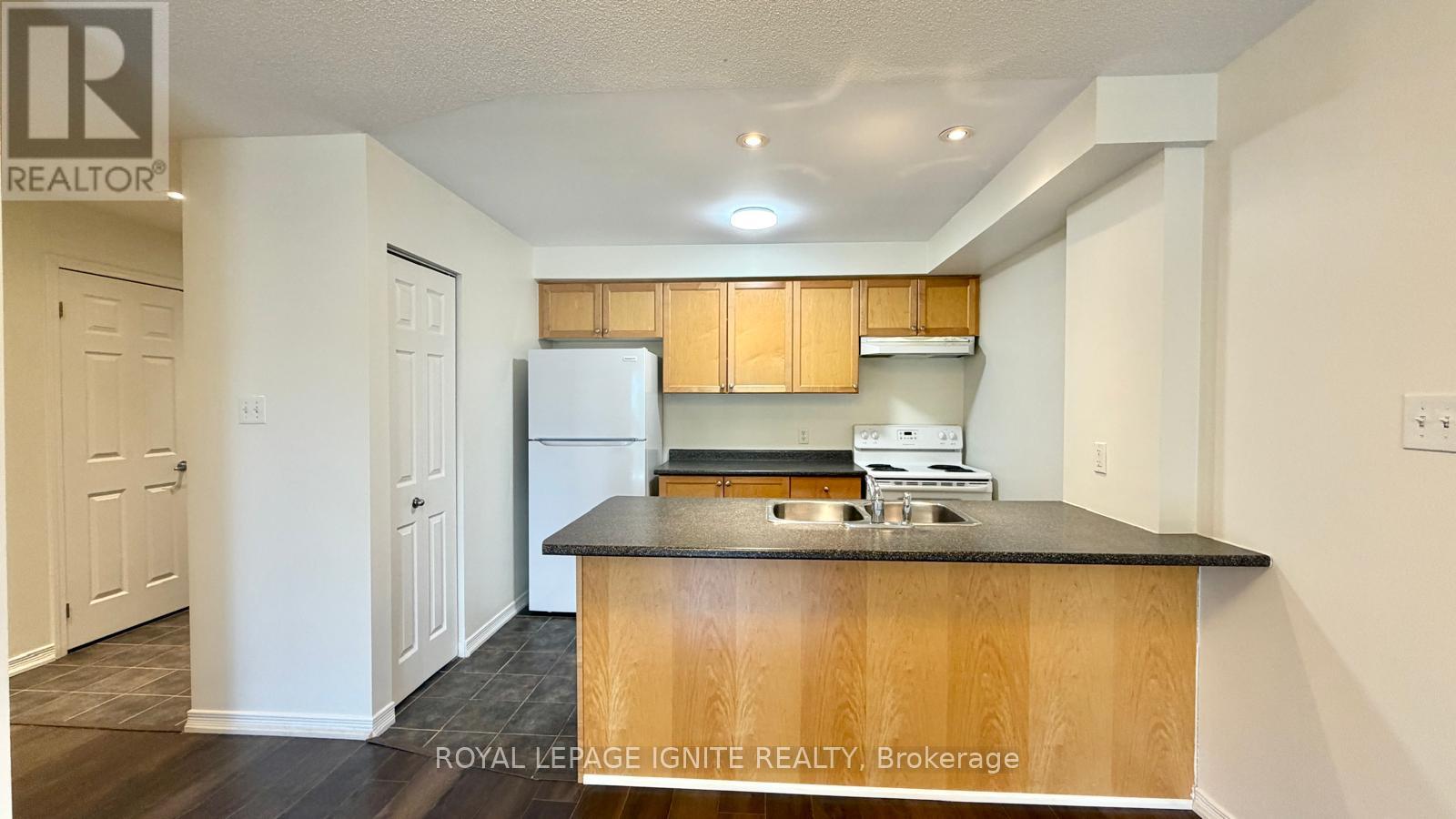 310 - 128 Aspen Springs Drive, Clarington, Ontario  L1C 0G9 - Photo 6 - E13031730