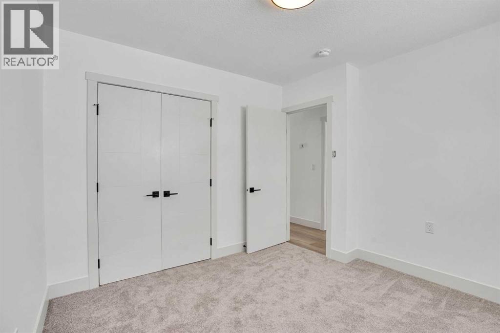 908 Stonehaven Road Sw, Calgary, Alberta  T2W 0P6 - Photo 19 - A2295086