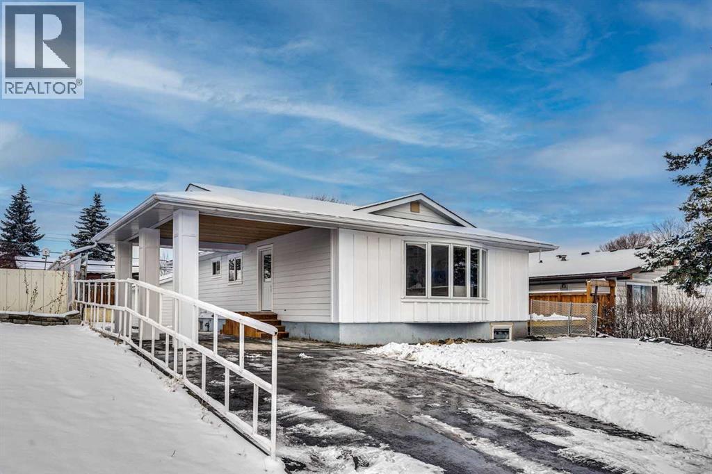 908 Stonehaven Road Sw, Calgary, Alberta  T2W 0P6 - Photo 2 - A2295086