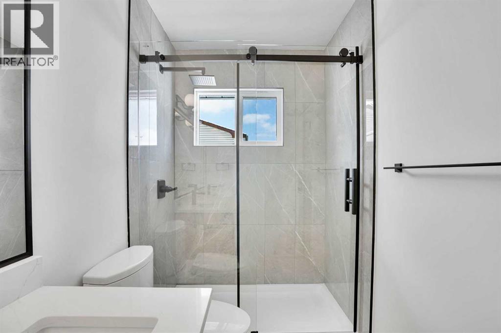 908 Stonehaven Road Sw, Calgary, Alberta  T2W 0P6 - Photo 24 - A2295086