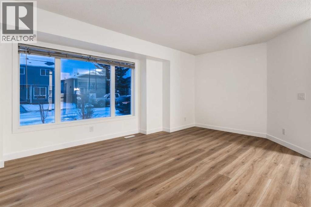 33 Martindale Court NE, Calgary, Alberta  T3J 2V8 - Photo 6 - A2301257