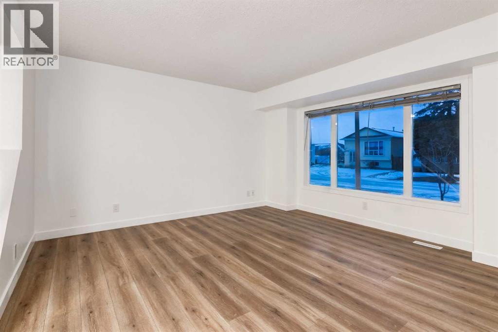 33 Martindale Court NE, Calgary, Alberta  T3J 2V8 - Photo 5 - A2301257