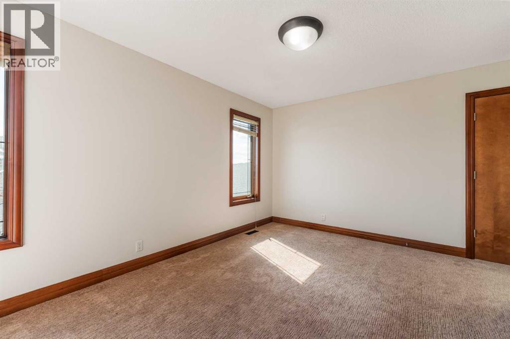 8 Coulee Park SW, Calgary, Alberta  T3H 5J5 - Photo 37 - A2299481