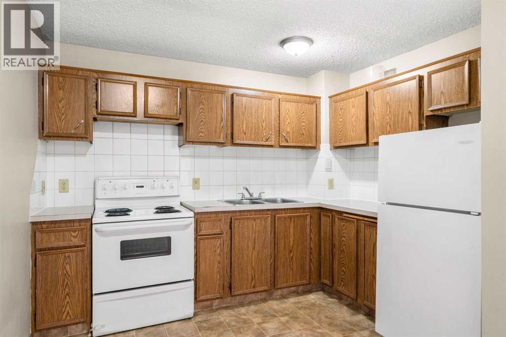 93, 1155 Falconridge Drive NE, Calgary, Alberta  T3J 1E1 - Photo 5 - A2275726