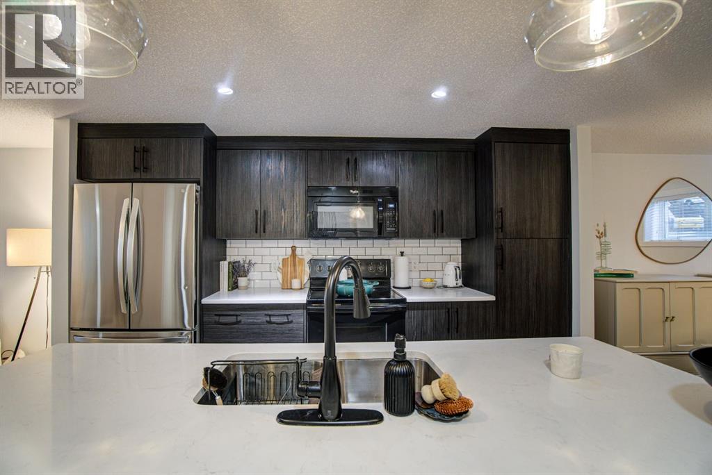 410, 50 Westland Road, Okotoks, Alberta  T1S 0B4 - Photo 2 - A2302151