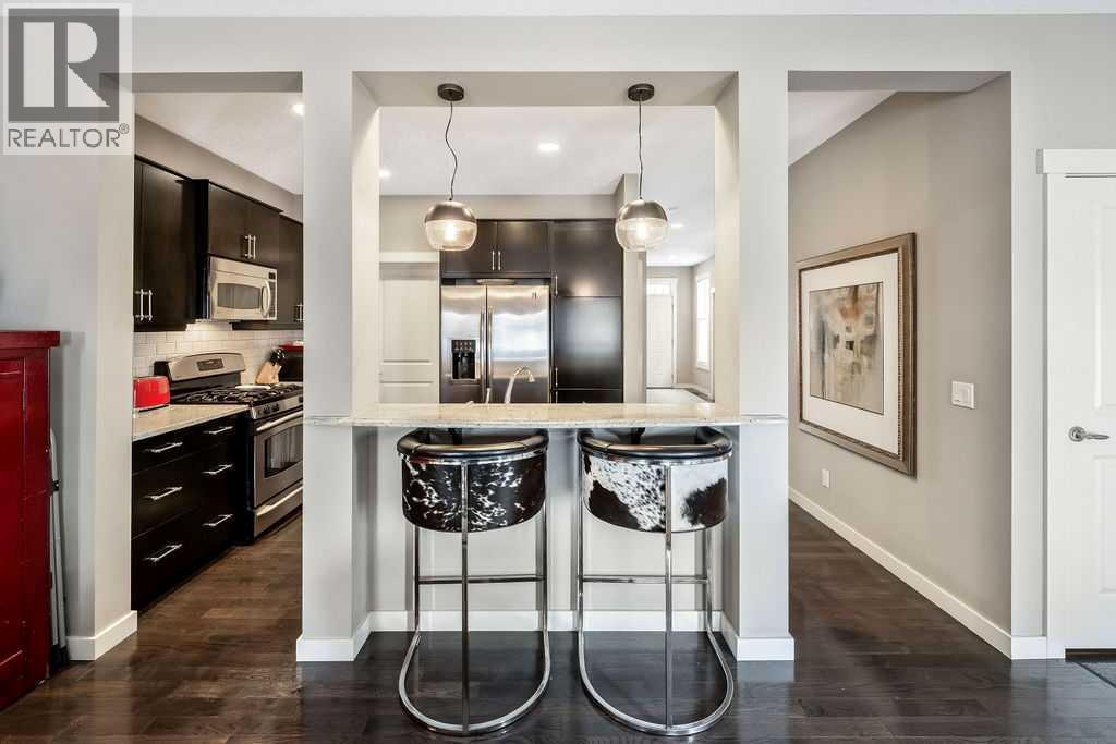 78 Ypres Green SW, Calgary, Alberta  T2T 6M1 - Photo 4 - A2288359