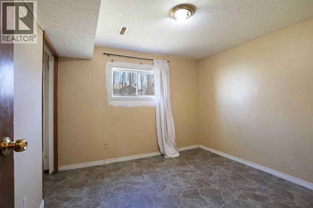 184 Upland Boulevard W, Brooks, Alberta  T1R 0R1 - Photo 38 - A2302379