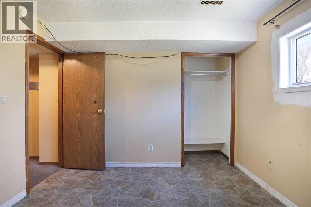 184 Upland Boulevard W, Brooks, Alberta  T1R 0R1 - Photo 39 - A2302379