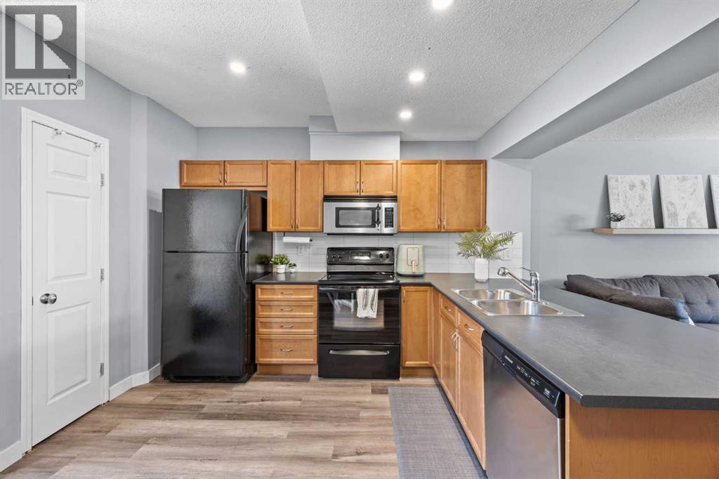 3065 New Brighton Gardens Se, Calgary, Alberta  T2Z 0A4 - Photo 13 - A2304080