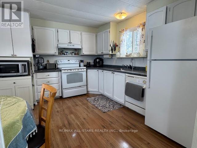 13 Fenelon Way, Kawartha Lakes, Ontario  K9V 0H9 - Photo 4 - X12842546