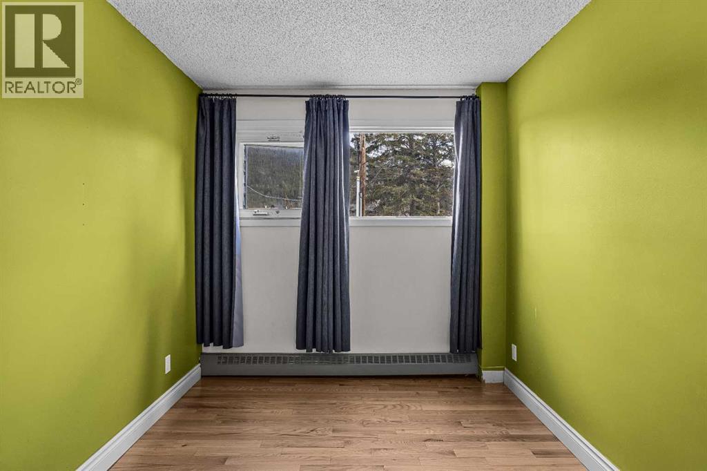 J, 413 Marten Street, Banff, Alberta  T1L 1G6 - Photo 33 - A2304248