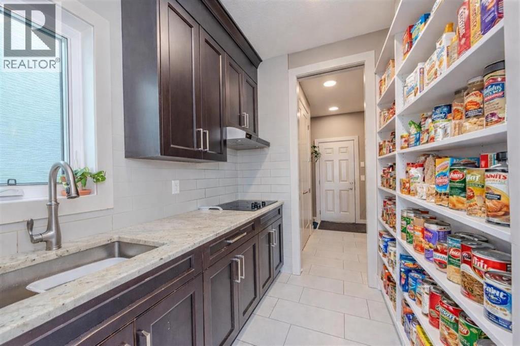 105 Carringvue Manor NW, Calgary, Alberta  T3P 0W2 - Photo 4 - A2294459