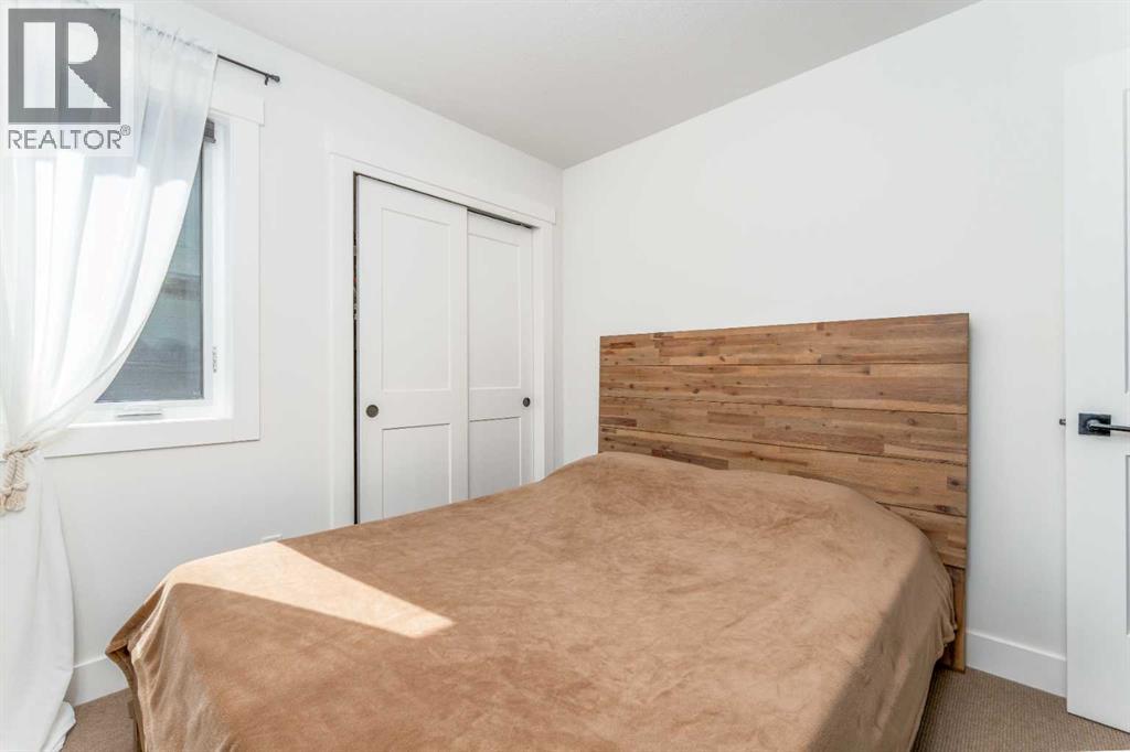 306 Cottageclub Link, Rural Rocky View County, Alberta  T4C 1B1 - Photo 18 - A2296125