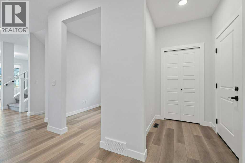 71 Ranchers View, Okotoks, Alberta  T1S 5R6 - Photo 4 - A2285159