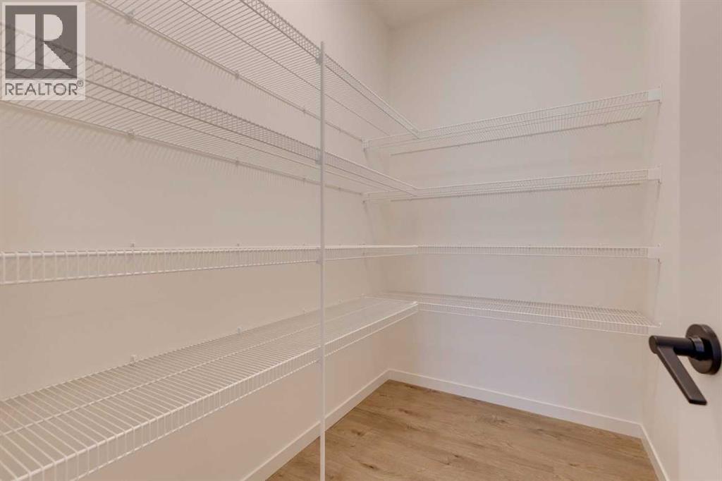 1402 Bayview Crescent SW, Airdrie, Alberta  T4B 5N9 - Photo 15 - A2275452