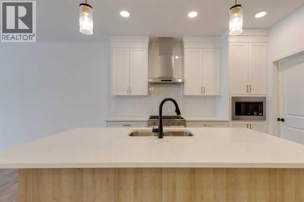 1402 Bayview Crescent SW, Airdrie, Alberta  T4B 5N9 - Photo 9 - A2275452