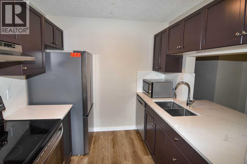 109, 2022 Canyon Meadows Drive Se, Calgary, Alberta  T2J 7H1 - Photo 2 - A2302347